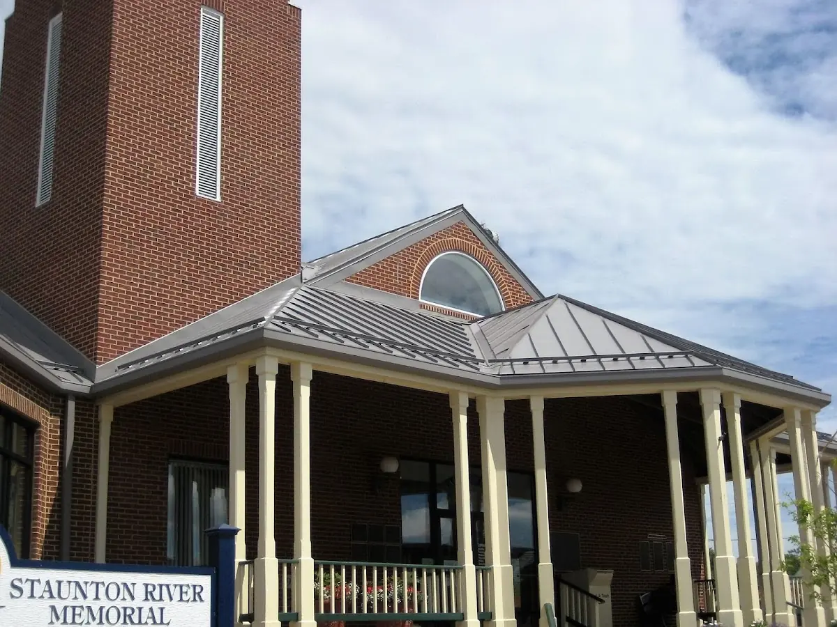 Skilled roofing craftsmen working on a residential roof in Lilburn